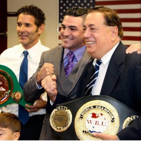 Danny McDermott pictured here with North Bergen Mayor and NJ State Senator Nicholas Sacco at McDermotts Commencement after winning the WBU World title and WBC Asia Continental title.